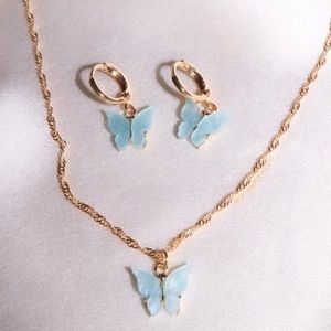 Blue butterfly charm necklace